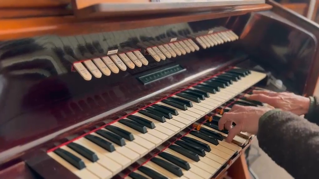Close-up of the organ's keyboards and stops